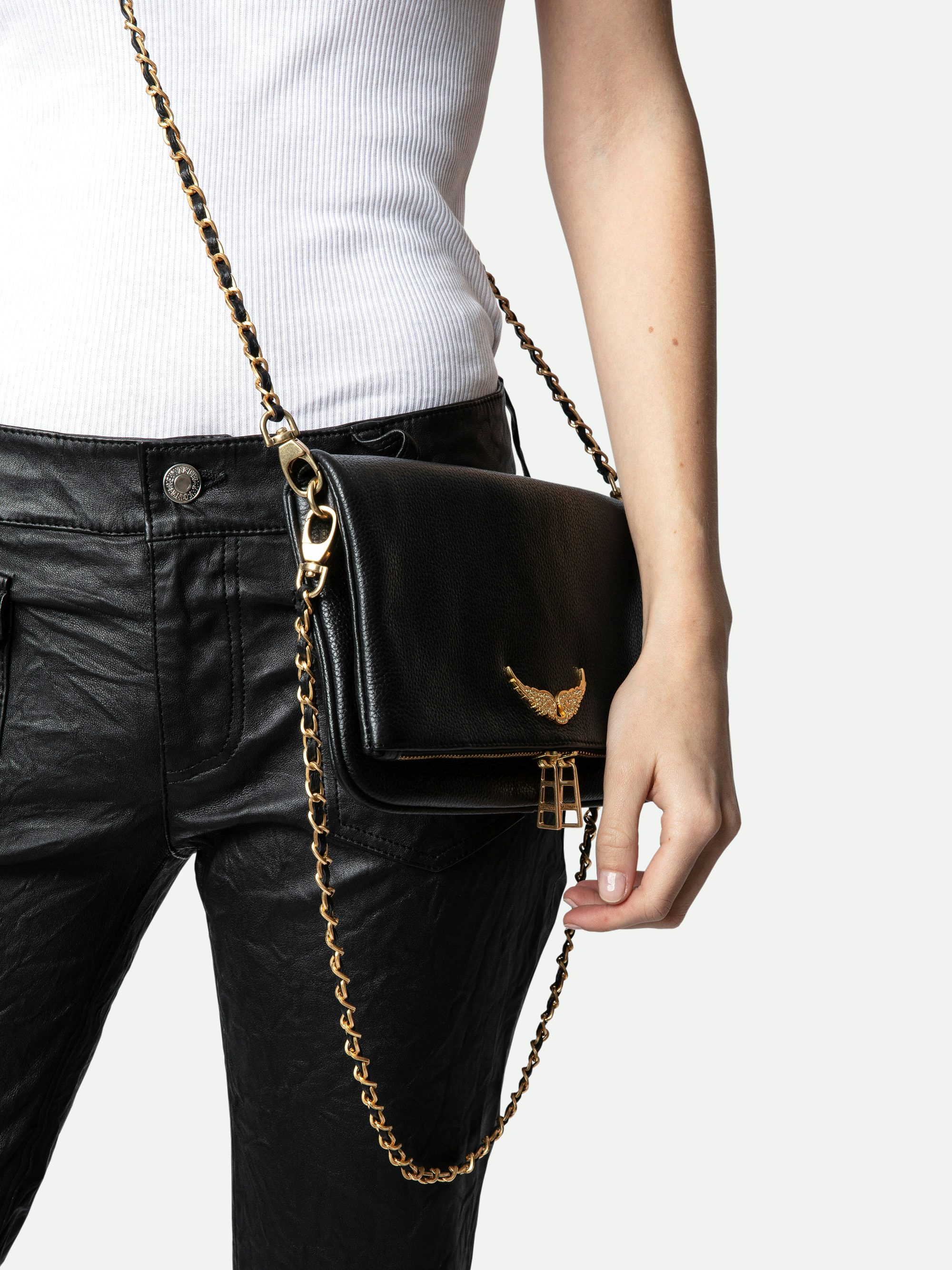 Rock Clutch - Grained leather clutch with double leather and metal chains and rhinestone-adorned wings.